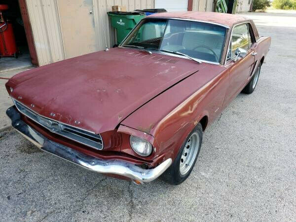 1965 Burgundy Ford Mustang Coupe