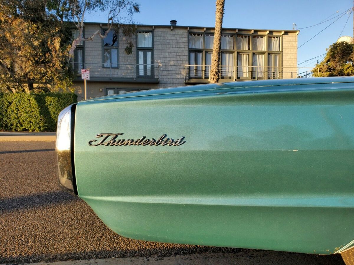 1966 Teal Ford Thunderbird Convertible