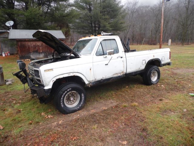 1985 Red Ford F-150 Standard Cab Pickup