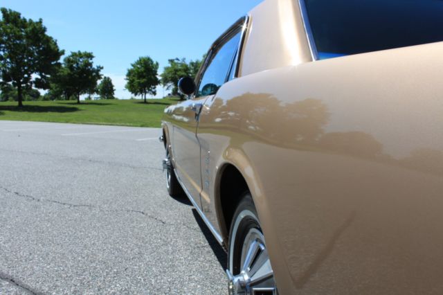 1966 Gold Ford Mustang Coupe