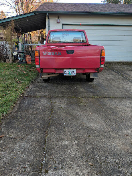 1990 Red (faded) Nissan Other Pickups