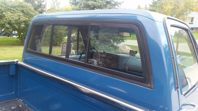 1979 silver over blue GMC Sierra 2500 regular cab long box