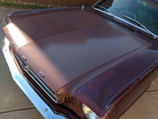 1965 Burgundy Ford Mustang Coupe