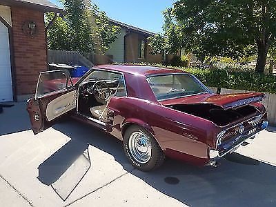 1967 Burgundy Ford Mustang Coupe
