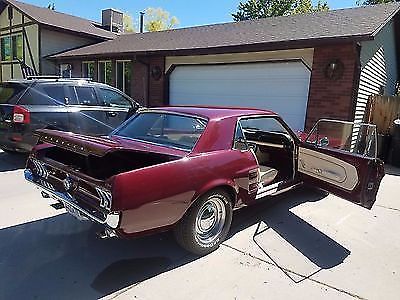 1967 Burgundy Ford Mustang Coupe