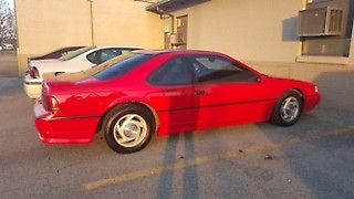 1991 Red Ford Thunderbird Coupe