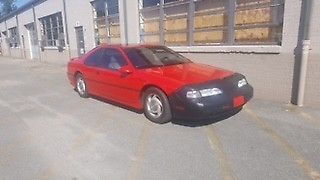 1991 Red Ford Thunderbird Coupe