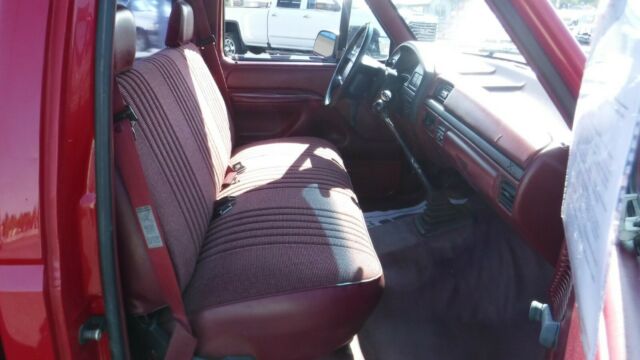 1994 Red Ford F-100 Standard Cab Pickup