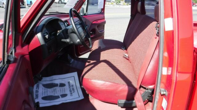 1994 Red Ford F-100 Standard Cab Pickup