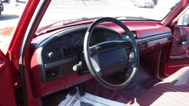 1994 Red Ford F-100 Standard Cab Pickup