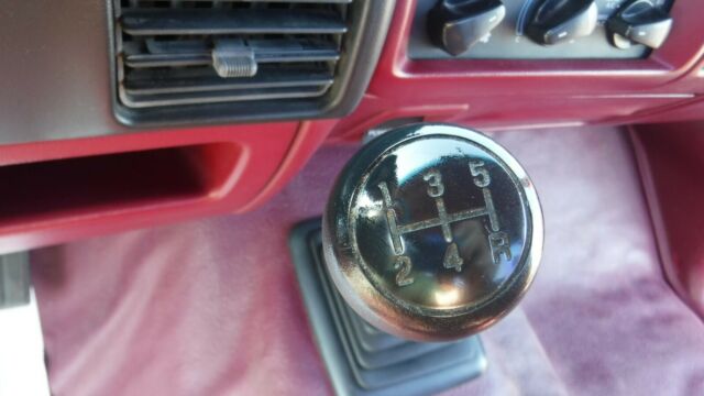 1994 Red Ford F-100 Standard Cab Pickup