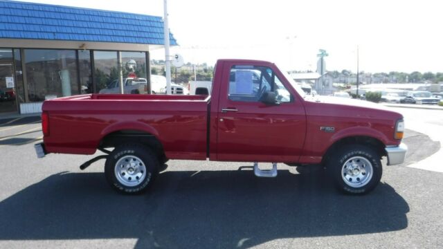 1994 Red Ford F-100 Standard Cab Pickup