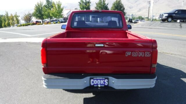 1994 Red Ford F-100 Standard Cab Pickup