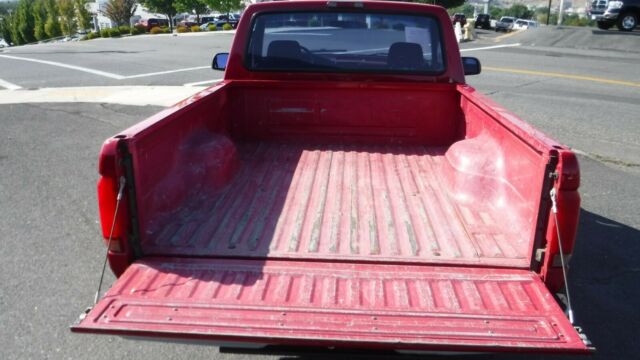 1994 Red Ford F-100 Standard Cab Pickup