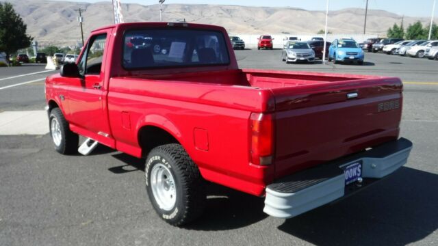1994 Red Ford F-100 Standard Cab Pickup