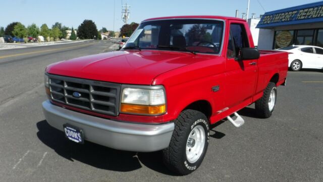1994 Red Ford F-100 Standard Cab Pickup