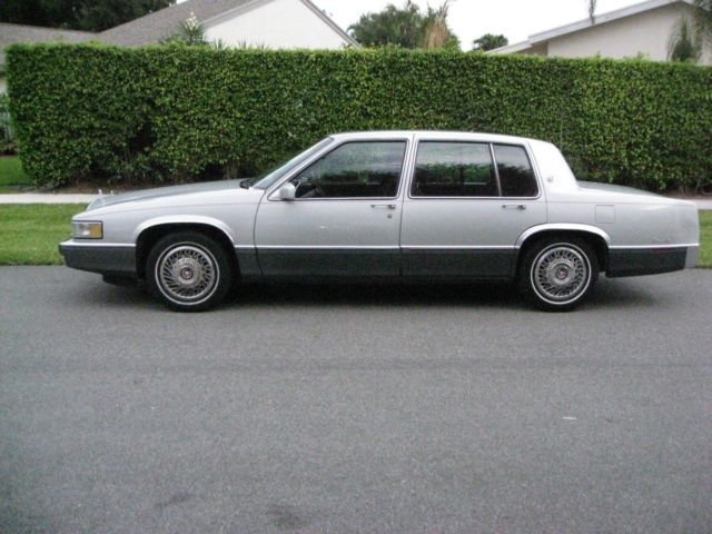 1989 Silver over Grey Metallic Cadillac DeVille 4 Door