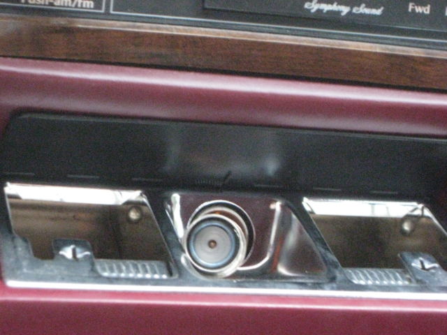 1989 Silver over Grey Metallic Cadillac DeVille 4 Door