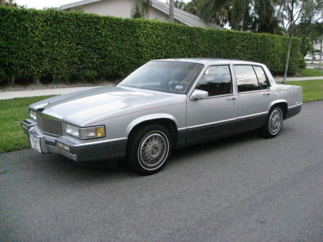 1989 Silver over Grey Metallic Cadillac DeVille 4 Door