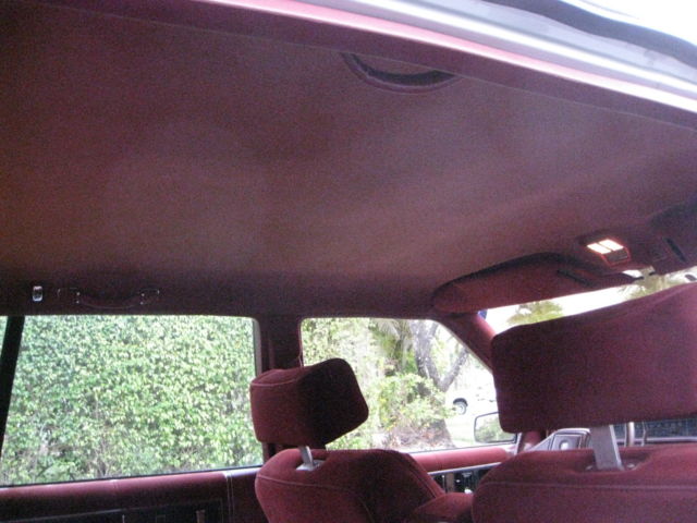 1989 Silver over Grey Metallic Cadillac DeVille 4 Door