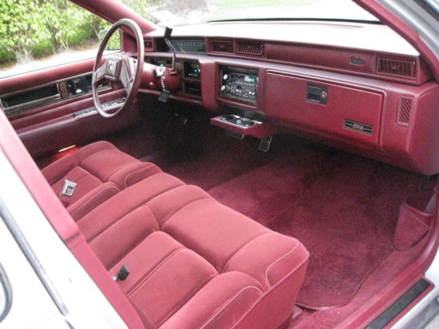 1989 Silver over Grey Metallic Cadillac DeVille 4 Door