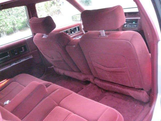 1989 Silver over Grey Metallic Cadillac DeVille 4 Door