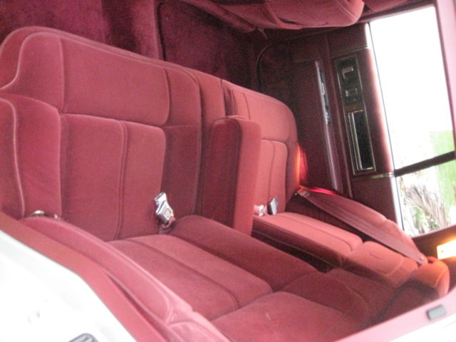 1989 Silver over Grey Metallic Cadillac DeVille 4 Door