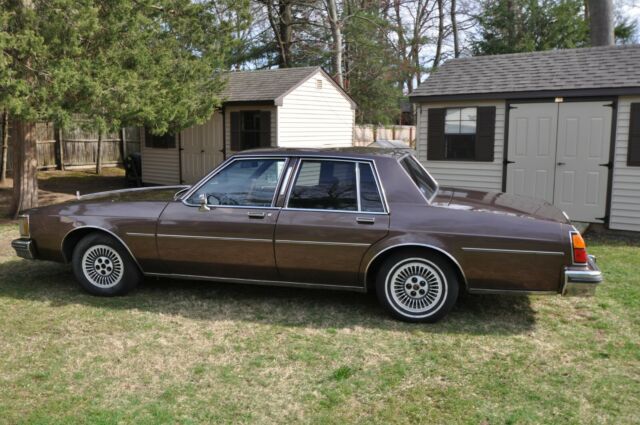 1984 brown Oldsmobile Eighty-Eight 4door ht