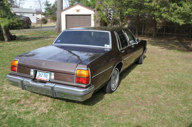 1984 brown Oldsmobile Eighty-Eight 4door ht