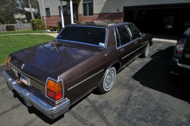 1984 brown Oldsmobile Eighty-Eight 4door ht
