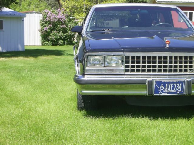 1986 black/silver Chevrolet El Camino --