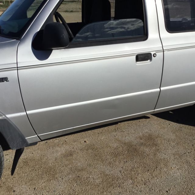 1994 Le blue Ford Ranger Crew Cab Pickup