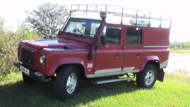 1990 Red Land Rover Defender Crew Cab Pickup