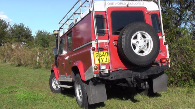 1990 Red Land Rover Defender Crew Cab Pickup