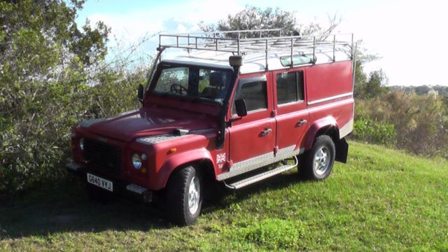 1990 Red Land Rover Defender Crew Cab Pickup