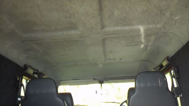 1990 Red Land Rover Defender Crew Cab Pickup