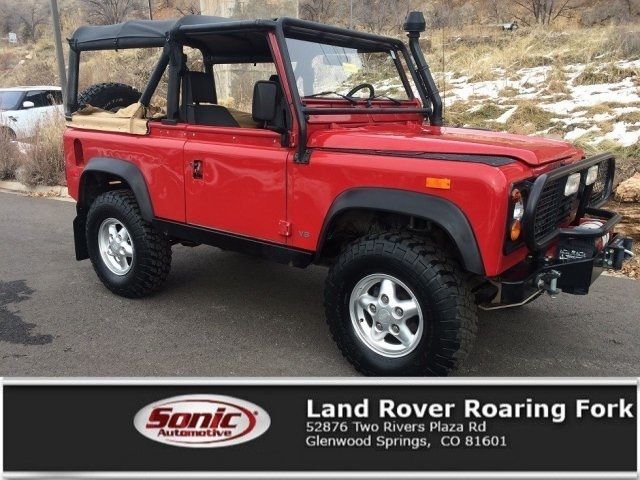 1994 Red Land Rover Defender --