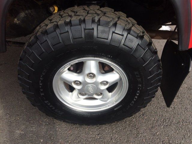 1994 Red Land Rover Defender --