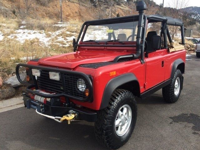 1994 Red Land Rover Defender --