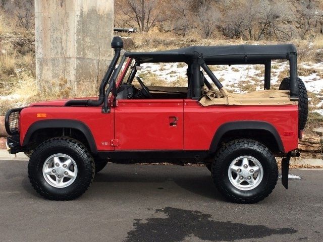 1994 Red Land Rover Defender --