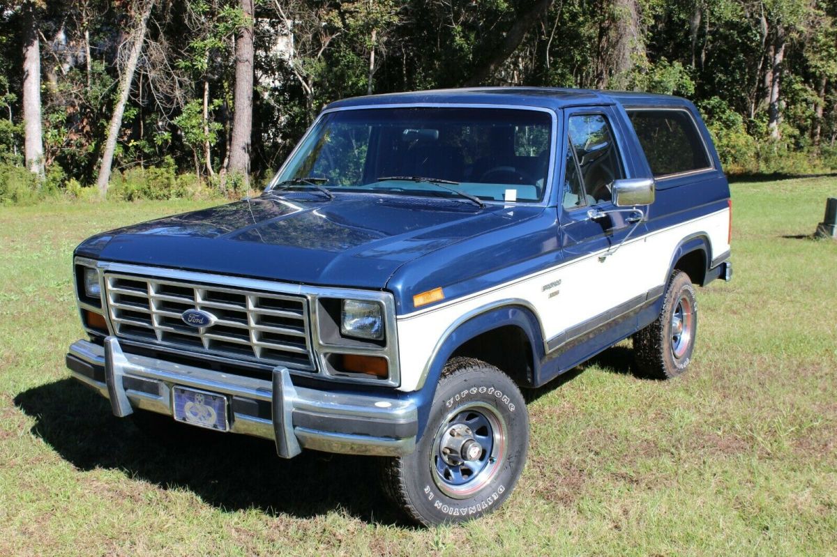 1986 Blue and White Ford Bronco