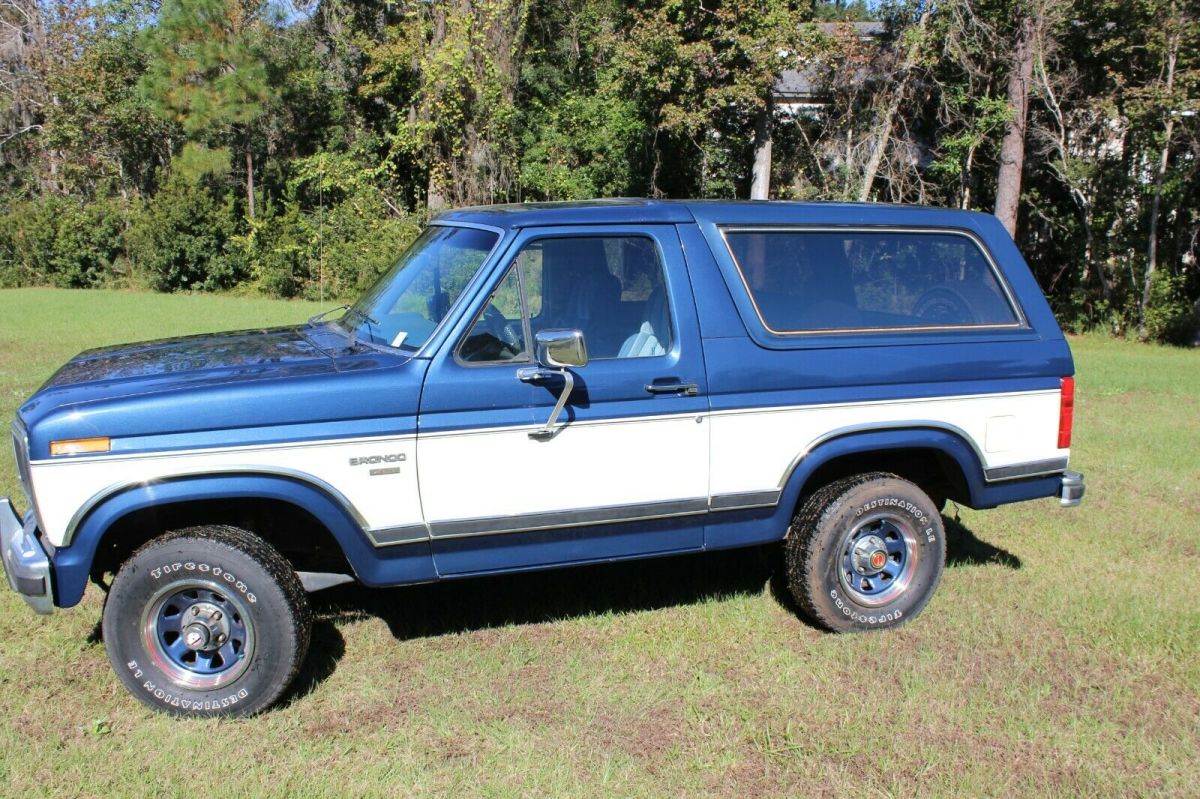 1986 Blue and White Ford Bronco