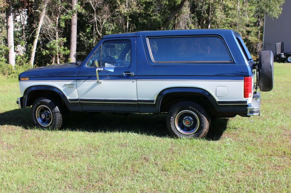 1986 Blue and White Ford Bronco