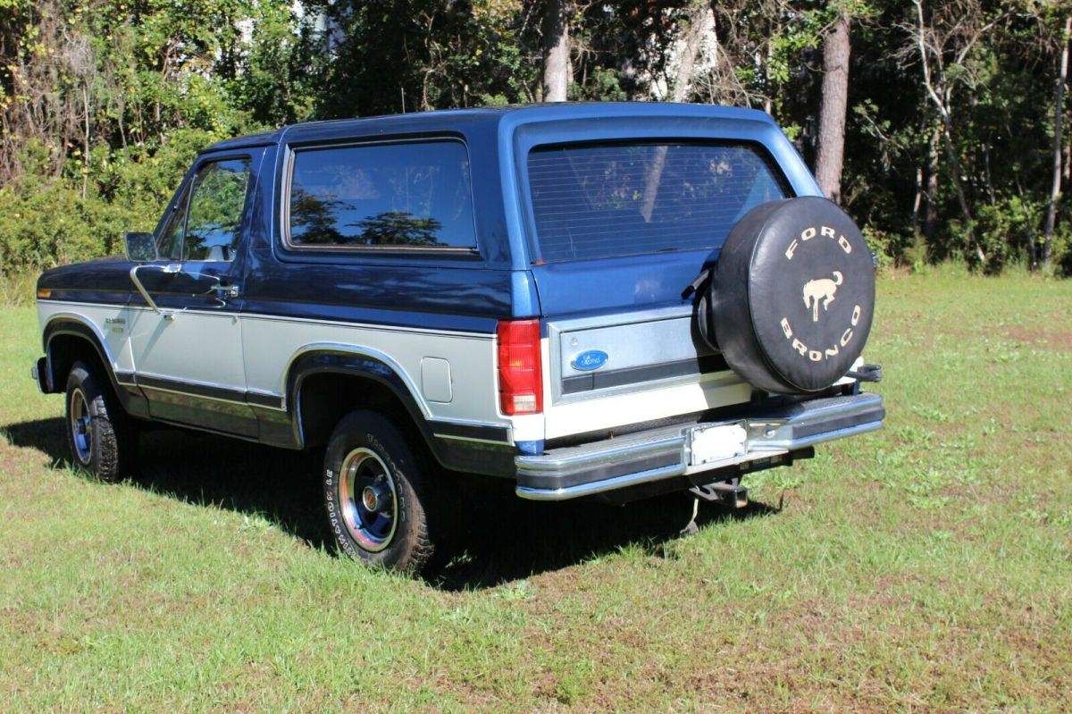 1986 Blue and White Ford Bronco