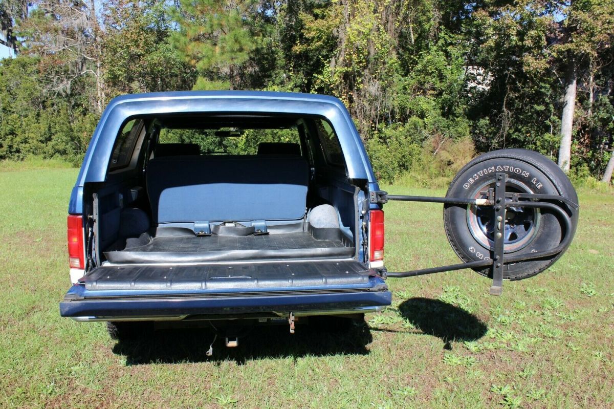 1986 Blue and White Ford Bronco