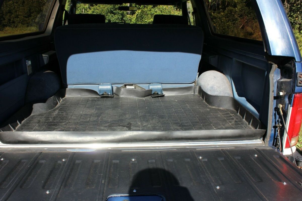 1986 Blue and White Ford Bronco