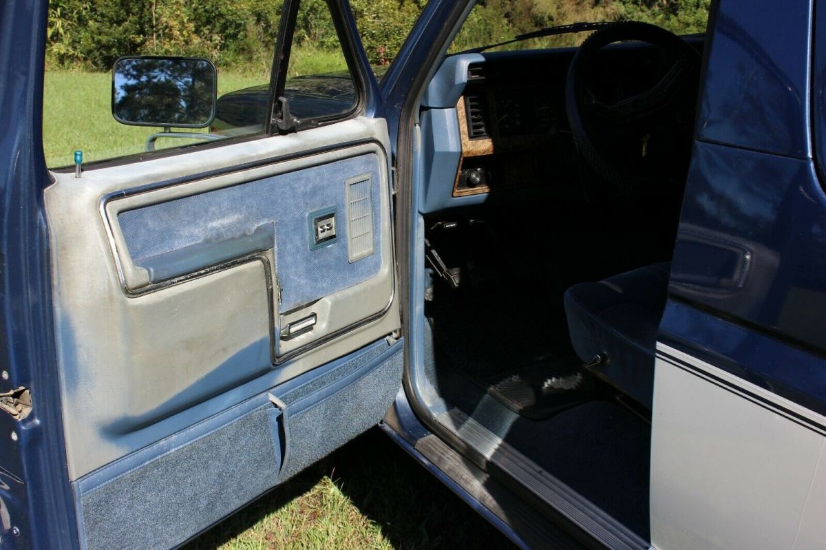 1986 Blue and White Ford Bronco