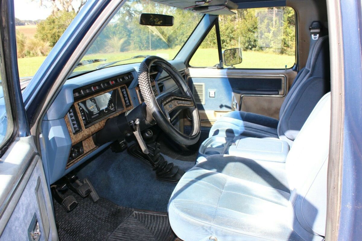 1986 Blue and White Ford Bronco