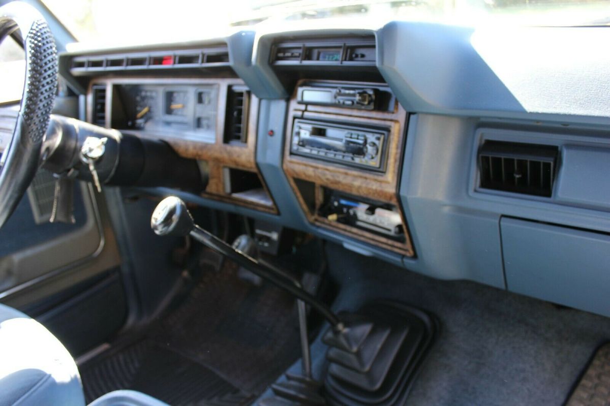1986 Blue and White Ford Bronco