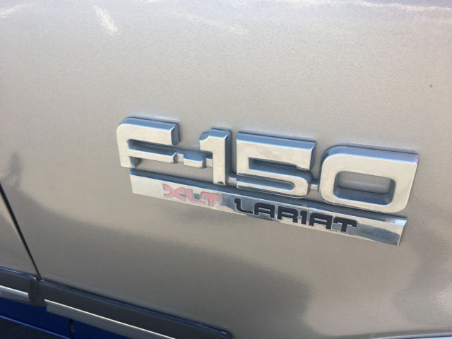 1990 Blue Ford F-150 Crew Cab Pickup